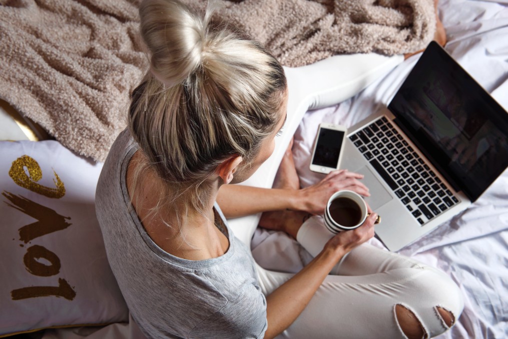 A woman recovers after her abdominoplasty in Indianapolis