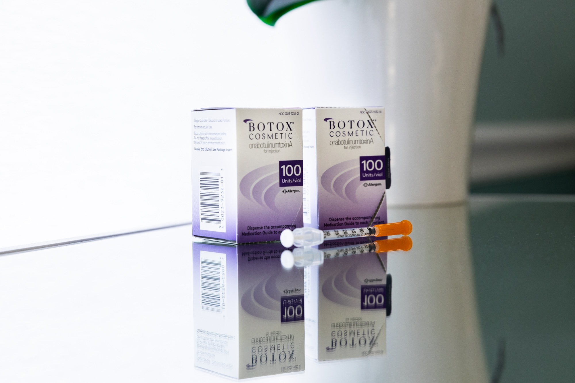 Vials of Botox sit on a sterile surface, prepared for use in masseter Botox in Carmel.