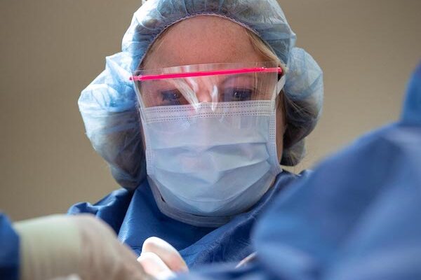 Dr. Turkle performs a patient's surgical skin tightening after lipo in Indiana. 