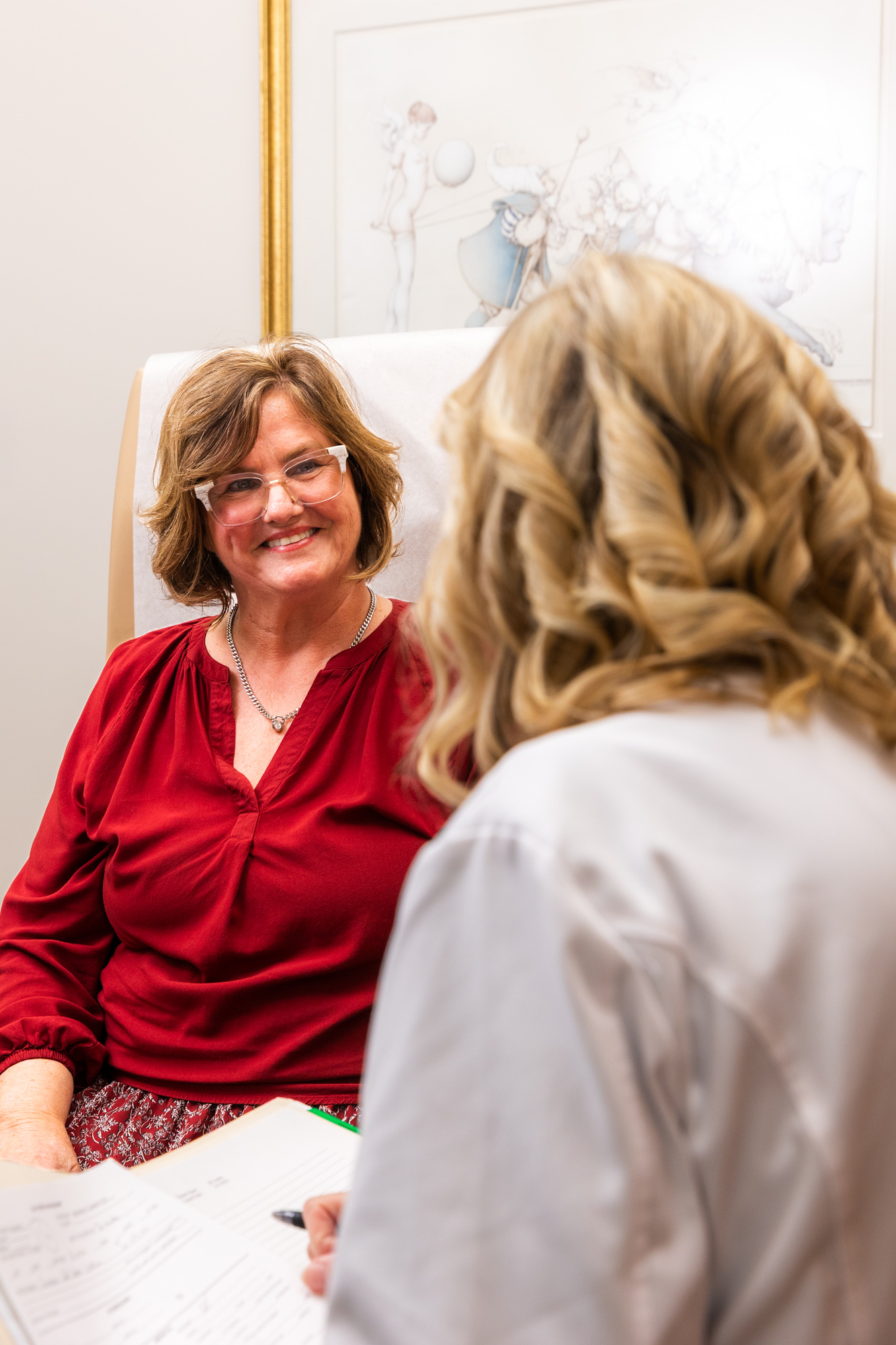 Provider meets with client in a consultation.