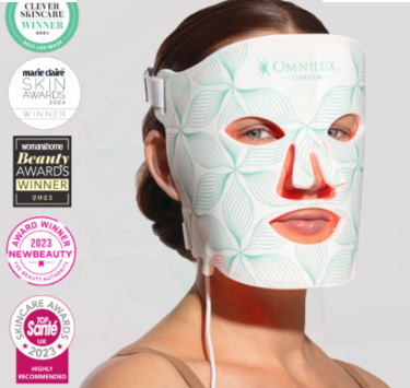 Female patient with hair pulled back wearing the OmniLux contour Mask for Women